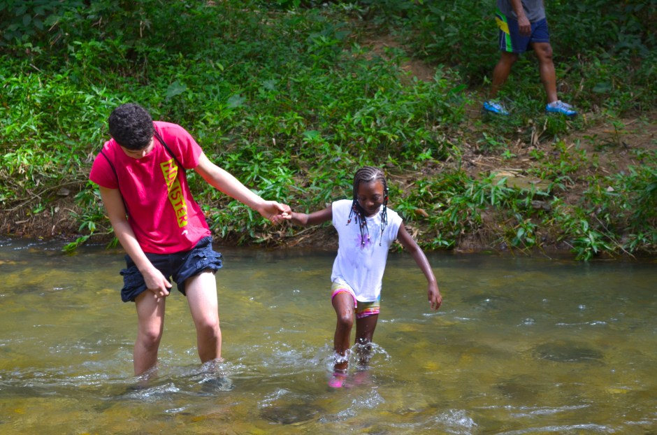 miles helps n across